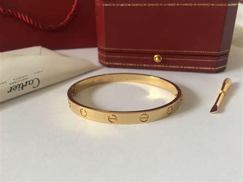 bracelet cartier love homme|cartier men' s cuff bracelet.